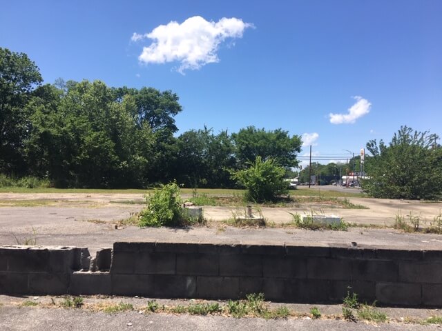 abandoned gas station site on Eighth Avenue North in Bessemer